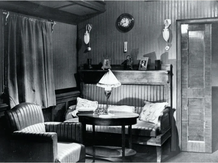Interior of the saloon in an imperial railway carriage.